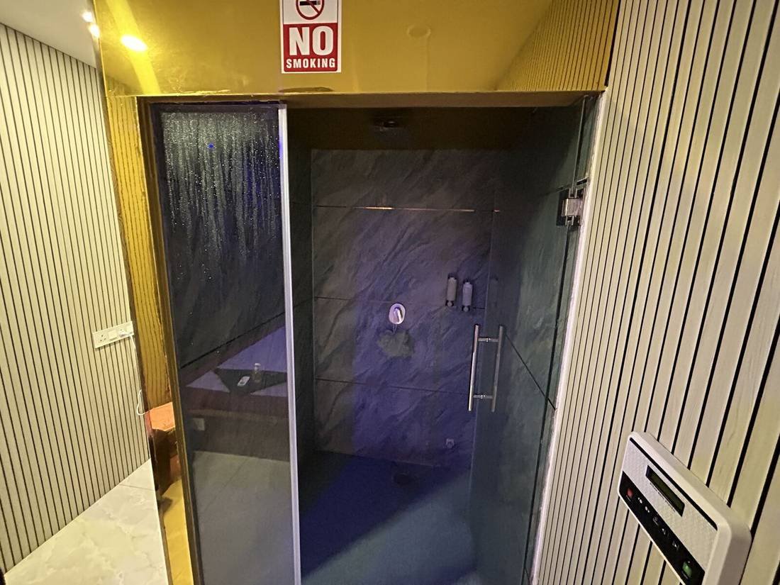 Rainfall shower cabin at Wings Spa