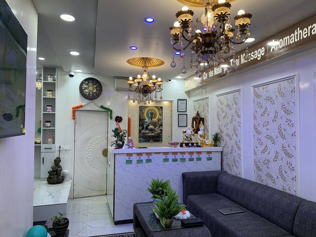Reception area with Buddha statue at Wings Spa