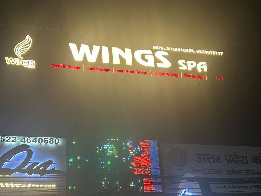 Wings Spa illuminated sign board